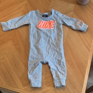 Nike Grey One-Piece Sleep n Play with Orange Logo